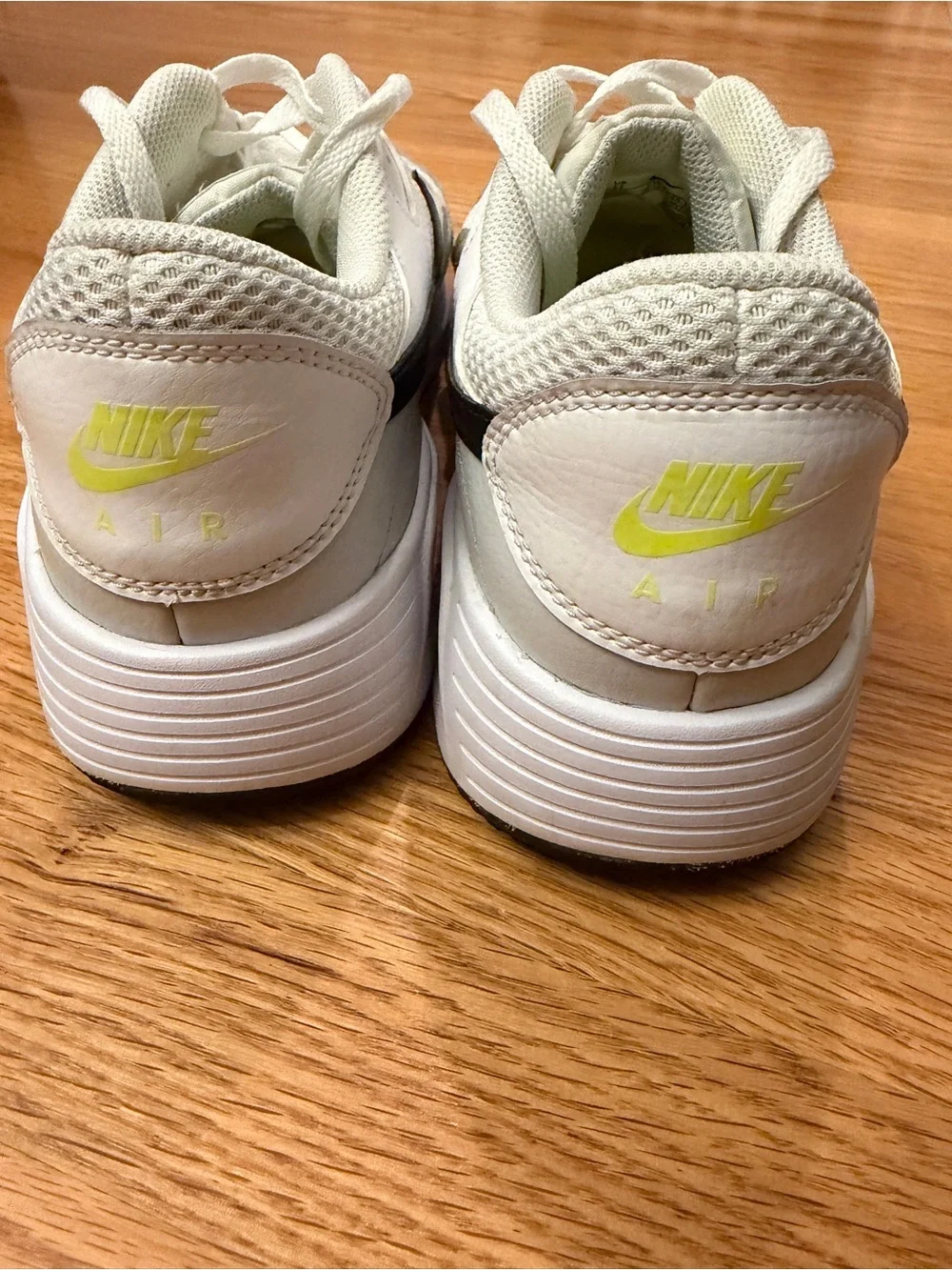 Nike Men's White Sneakers with Black Swoosh and Neon Yellow Accents